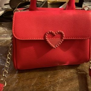 I am selling a Betsy Johnson purse!